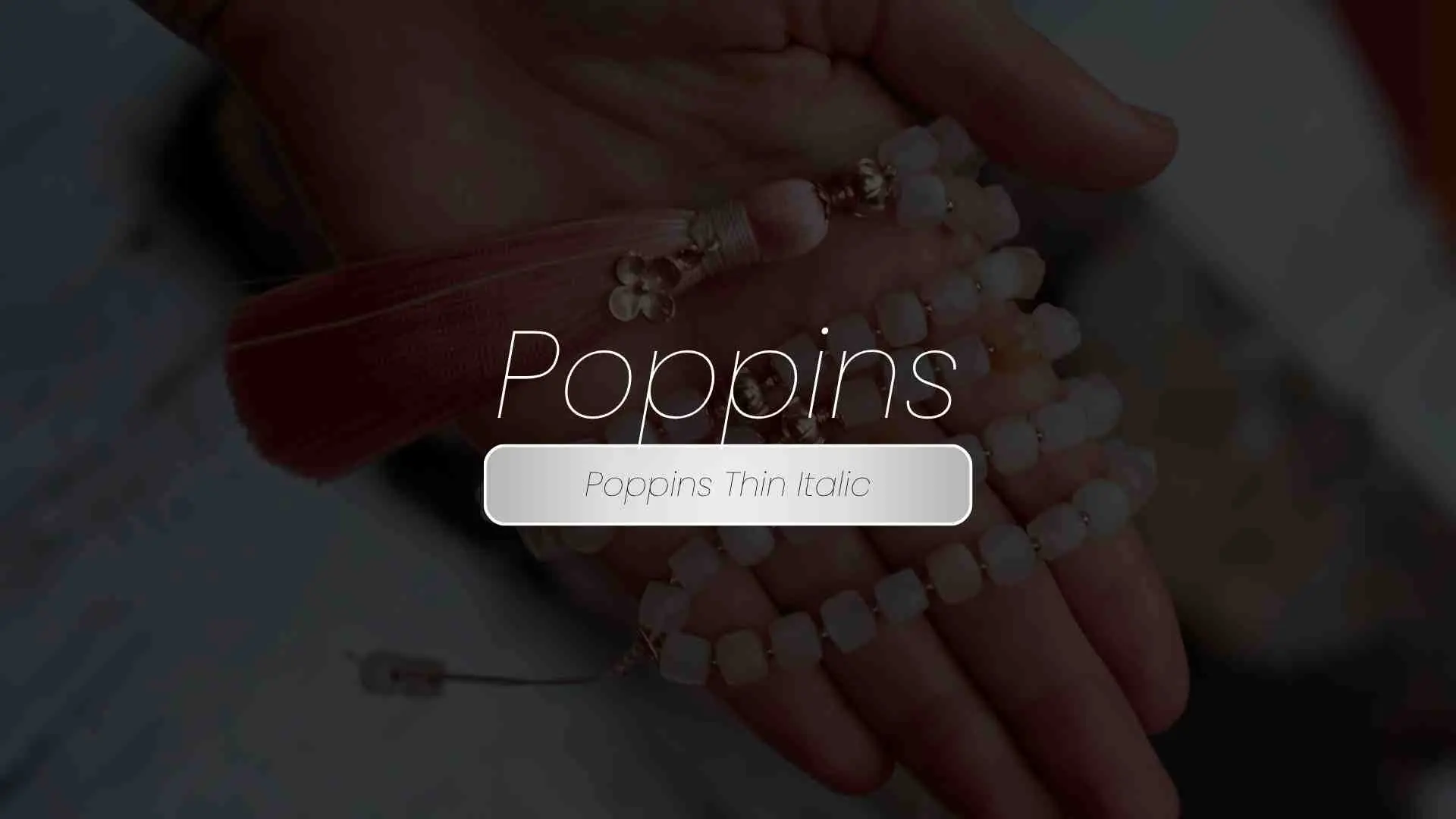 Poppins Thin Italic